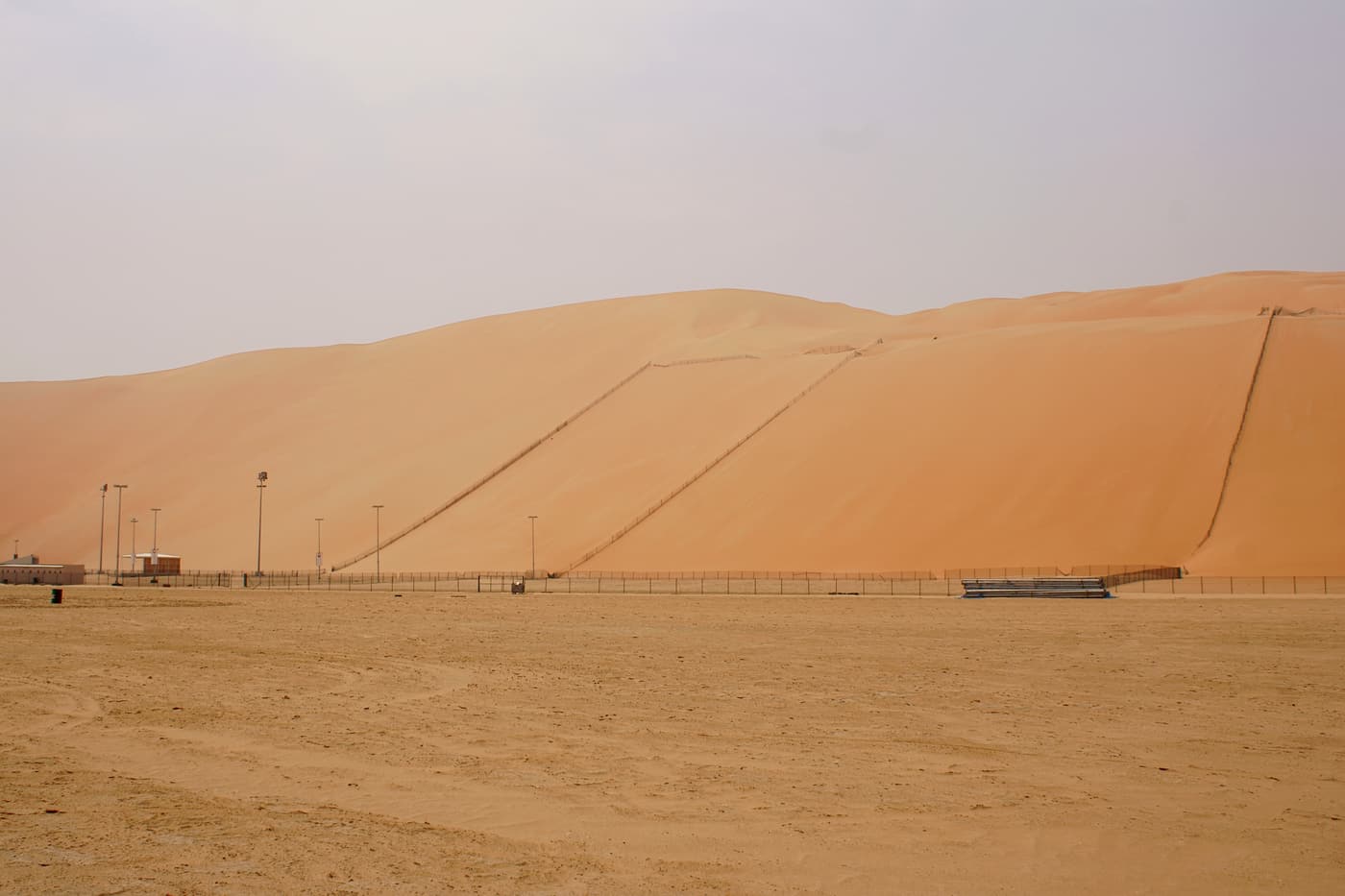 The steep face of Moreeb Dune with a track running up it