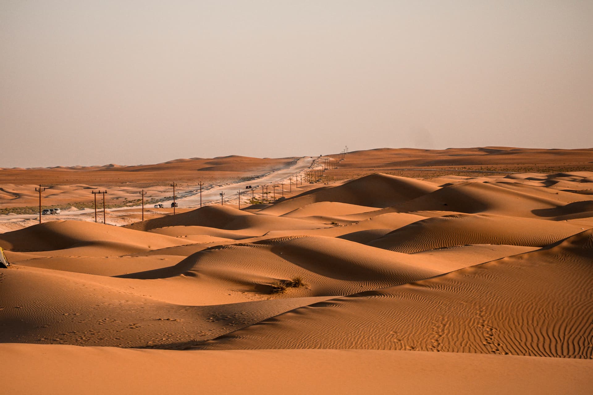 Rolling orange sand dunes in the Abu Dhabi desert